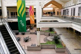  ?? HYOSUB SHIN / HSHIN@AJC.COM ?? The vacant food court area inside Gwinnett Place Mall in Duluth. New developmen­t could come to the mall and the area nearby.