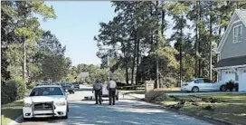  ?? JEFFREY S. COLLINS/AP ?? Police patrol the area of Wednesday’s fatal shooting on Thursday in Florence, S.C.