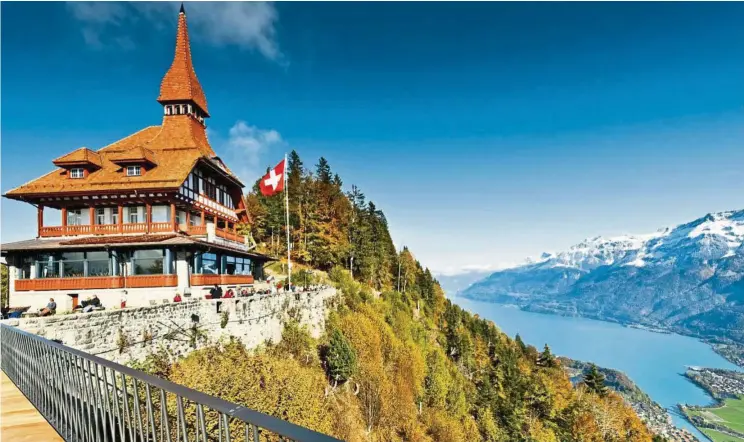  ?? — Interlaken Tourism ?? Panoramic view of Lakes Thun and Brienz, as well as Eiger, Monch and Jungfrau, from Harder Kulm, above Interlaken.