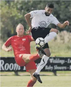  ??  ?? Seaham Red Star still miss long-term injury victim Craig Lynch (left, red). Washington will hope Michael Laws (right, red) can stop North Shields.