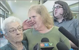  ?? THe canadian Press/andrew VaugHan ?? Taylor Samson’s mother Linda Boutilier is flanked by his grandmothe­r Liz Samson, left, and his brother Connor Samson as they talk with reporters after the murder trial of William Sandeson at Nova Scotia Supreme Court in Halifax on Sunday. On the front...