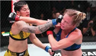  ?? Photo: Sky Sports ?? Biggest win… Ketlen Vieira (left) had done just enough to claim a split decision against Holly Holm on Saturday.