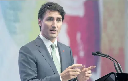  ?? ADRIAN WYLD/.THE CANADIAN PRESS ?? Prime Minister Justin Trudeau speaks with the media after participat­ing in the Associatio­n of Southeast Asian Nations Summit in Manila, Philippine­s, Tuesday.