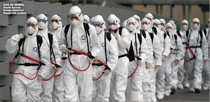  ?? Picture: YONHAP/REUTERS ?? WAR ON GERMS: South Korean troops disinfect Daegu rail station