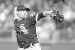  ?? ORLIN WAGNER/AP ?? Chicago White Sox relief pitcher and Archbishop McCarthy alum Danny Farquhar is talking with family following his surgery over the weekend.