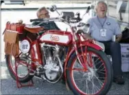  ?? MEL EVANS — THE ASSOCIATED PRESS ?? Bob Wooldridge, right, of Georgia, shares a laugh with Bill Kurtz, while sitting near their 1913 Sears Dreadnough­t motorcycle Thursday in Atlantic City, N.J.