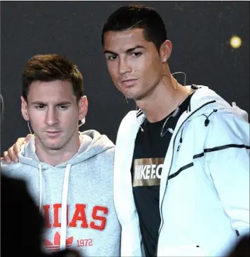  ??  ?? Lionel Messi of Barcelona and Argentina and Cristiano Ronaldo, Real Madrid and Portugal, during a press interview before the FIFA Ballon D’Or 2014 awards.