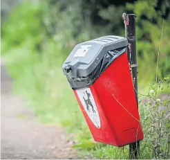  ??  ?? Many dog poo bins have not been emptied.