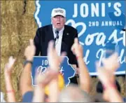  ?? GERALD HERBERT/AP ?? Donald Trump rallies supporters at a fundraiser for Republican Sen. Joni Ernst on Saturday in Des Moines, Iowa.