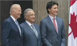  ?? Andrew Harnik Associated Press ?? PRESIDENT Biden meets with Mexican counterpar­t Andrés Manuel López Obrador, center, and Canadian Prime Minister Justin Trudeau in Mexico City.