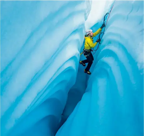  ??  ?? This and facing pages: ice climbing is a discipline that is akin to running a 100m sprint vertically.