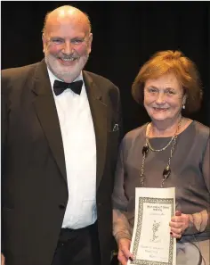  ??  ?? Jean Kelly from Delgany ICA Drama Group, who received a merit award from festival director William Mansefield.