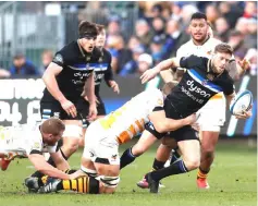  ?? — Reuters photo ?? Rhys Priestland of Bath Rugby in action with Joe Launchbury of Wasps.