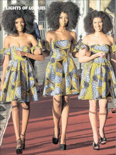  ??  ?? Models Samke Mhlongo, Nothando Mashaba and Jamie-lee Harris walk the red carpet during Durban’s hosting of the advertisin­g industry’s Loerie Awards.the Loeries’ creative festival brings with it innovative minds, internatio­nal thought leadership, an...