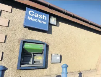  ??  ?? Charging for withdrawal Cash machine at the Keystore in Troon’s Muirhead