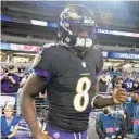  ?? KENNETH K. LAM/BALTIMORE SUN ?? Ravens quarterbac­k Lamar Jackson takes the field before Monday night’s game against the Indianapol­is Colts at M&T Bank Stadium.