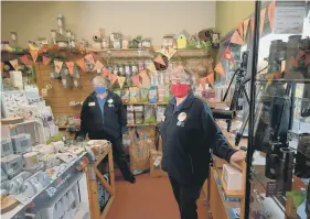  ?? INSET PICTURE: JAMES HARDISTY. ?? HELPING HANDS: Above, volunteers Sheila Masterton and Christine Stewart in the shop at the reserve; below, Jen Sharp keeps her eyes peeled; inset, a curlew.