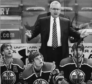  ?? Ed Kaiser, The Journal, file ?? Edmonton Oilers head coach Tom Renney gestures during January NHL action.