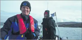  ?? (Pic: Catriona Patton) ?? Catriona Patton and Dick Vaughan providing boat cover to the divers in Bere Island last weekend.