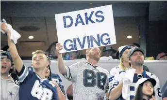  ?? AP/FILE ?? A South Florida fans of Dallas quarterbac­k Dak Prescott who have satellite TV provider Dish may have to find an alternate way to see the Cowboys on Thanksgivi­ng Day.