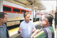  ?? Ned Gerard / Hearst Connecticu­t Media ?? Ned Lamont speaks to commuters during a campaign stop.