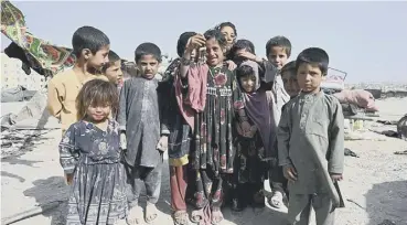  ??  ?? 0 Children who fled as fighting spread pictured at a camp for internally displaced people in Kabul