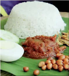  ??  ?? ‘Nasi lemak’, a favourite dish of Malaysians.