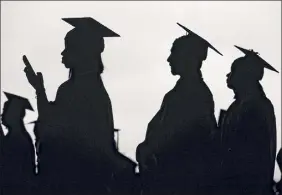  ?? Seth Wenig / Associated Press ?? New college graduates are struggling to find work as their first student loan payments loom on the horizon during the pandemic.