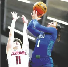  ?? MATT ROURKE/AP ?? FLORIDA GULF COAST’S ALYZA WINSTON shoots against Washington State’s Astera Tuhina during the second half of a first-round a game in the NCAA Tournament on Saturday in Villanova, Pa.