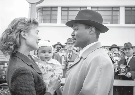  ?? FOX SEARCHLIGH­T ?? Rosamund Pike and David Oyelowo in A United Kingdom, based on the true story of the marriage between a prince from Botswana and a British white office worker. The film opens on Friday.