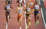  ?? GLYN KIRK/AFP/GETTY IMAGES ?? Canada’s Melissa Bishop, third from left, recovered from a stumble in qualifying heats Thursday in London.