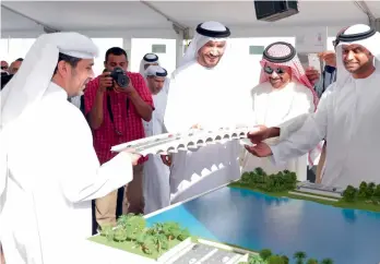  ??  ?? Khalifa Mohammed Al Mazrouei, Ahmed Shareef Al Khouri and other officials during the ceremony of laying the foundation stone for the road that connects Sheikh Zayed Bin Sultan Road with Umm Lafina and Al Reem Island.