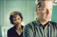  ?? Joe Viles / Fox ?? Kiefer Sutherland, with Sarah Lively, in a scene from “24.”