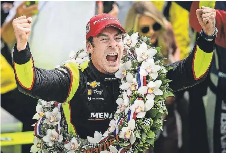  ?? GRACE HOLLARS/INDYSTAR ?? Simon Pagenaud celebrates winning the Indianapol­is 500 Sunday at Indianapol­is Motor Speedway.