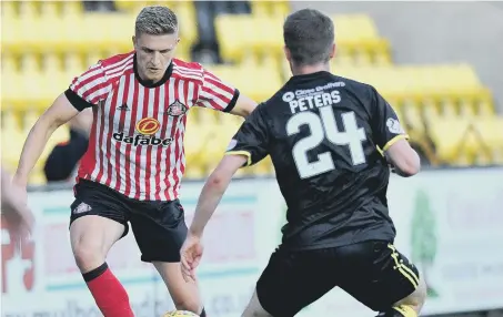  ??  ?? Sunderland youngster Michael Ledger in action during a pre-season friendly against Livingston.