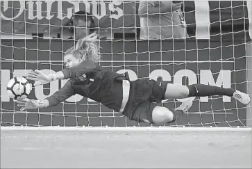  ?? Mark J. Terrill Associated Press ?? ALYSSA NAEHER stops a shot by Japan during a 3-0 victory for the U.S. at the Tournament of Nations.