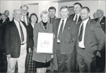  ?? 01_B11twe03 ?? A farewell party was held at Brodick Castle to say goodbye to administra­tor Veronica Woodman, who is leaving for Peebles. On her left is successor Ken Thorburn and head gardener Nigel Price. John Simcock of Friends of Brodick Castle is to her right.