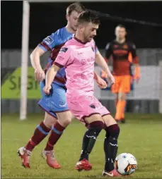  ??  ?? Thomas Croke on the ball as Luke Gallagher keeps a close watch.