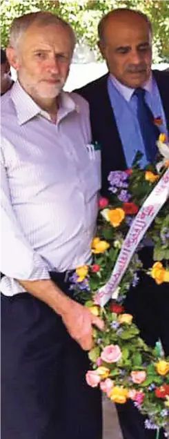  ??  ?? Visit: Jeremy Corbyn with a wreath at the cemetery