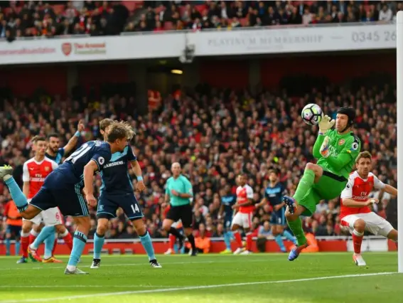  ??  ?? Petr Cech saved Arsenal a point in the 0-0 draw with Middlesbro­ugh (Getty)