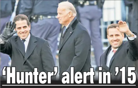  ??  ?? PROBLEM IN THE MAKING: Then-Veep Joe Biden is joined by sons Hunter (left) and Beau after the January 2009 Capitol inaugurati­on of Barack Obama. A State Department expert says that in 2015 he alerted Team Joe to Hunter’s possible Ukraine conflicts.