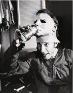  ??  ?? doCtor’s orders The film recreated this famous shot of Nick Castle drinking through the mask (right).