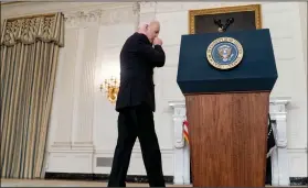  ?? (AP/Andrew Harnik) ?? President Joe Biden arrives Thursday to speak in the State Dining Room at the White House in Washington. Video at arkansason­line.com/911bidenxi/.