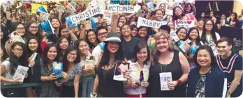  ??  ?? AUTHORS. From left, Tarryn Fisher, Christine Brae and Colleen Hoover with their fans at The Gallery in Ayala Center Cebu.