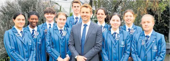  ?? Photo / Supplied ?? New 2023 Havelock North High School principal Joel Wilton with a group of senior students.