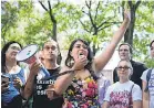  ?? JULIUS CONSTANTIN­E MOTAL/AP ?? New York state Sen. Jessica Ramos rallies against immigratio­n raids.