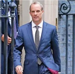  ?? CHEIS J RATCLIFFE/ GETTY ?? ● Dominic Raab – criticised for not returning from holiday