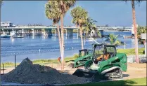  ?? BILL DIPAOLO / CONTRIBUTE­D ?? Constructi­on continues on a path along the waterfront at the Jupiter Lighthouse. More dirt and plants will be delivered to help complete the project.