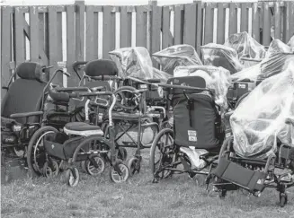  ?? POSTMEDIA NEWS ?? Wheelchair­s belonging to some of the residents of Camilla Care Community long-term care facility in Mississaug­a, Ont., who have lost their lives due to COVID-19.