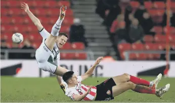  ?? ?? Sunderland striker Ross Stewart challenges Plymouth Argyle’s Jordan Houghton,